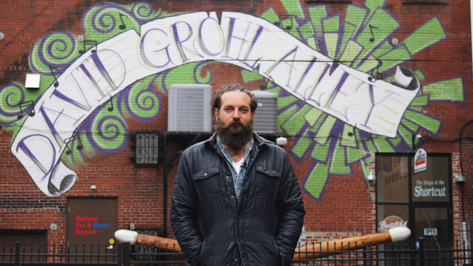 The Box Gallery owner Aaron Chine has done several public art works around the city, including the David Grohl Alley banner.