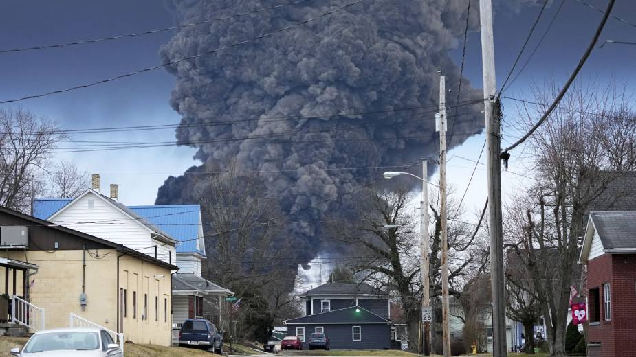 A black plume rises over East Palestine, Ohio, on Feb. 5, 2023, as a result of a controlled detonation of a portion of the derailed Norfolk Southern train. (AP Photo | Gene J. Puskar, File)