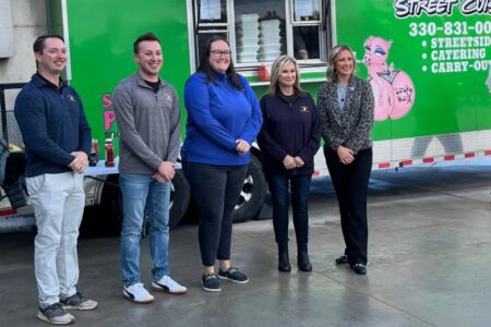 Posing in front of the food concession truck sponsored by the Columbiana County Port Authority for Workforce Appreciation Day are (from left) Haedan Panezott, private sector specialist; Robert Ritchey, recovery coordinator; Brittany Smith, assistant director; Penny Traina, director; and state Rep. Monica Robb Blasdel.