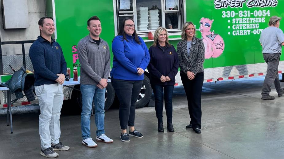 Posing in front of the food concession truck sponsored by the Columbiana County Port Authority for Workforce Appreciation Day are (from left) Haedan Panezott, private sector specialist; Robert Ritchey, recovery coordinator; Brittany Smith, assistant director; Penny Traina, director; and state Rep. Monica Robb Blasdel.